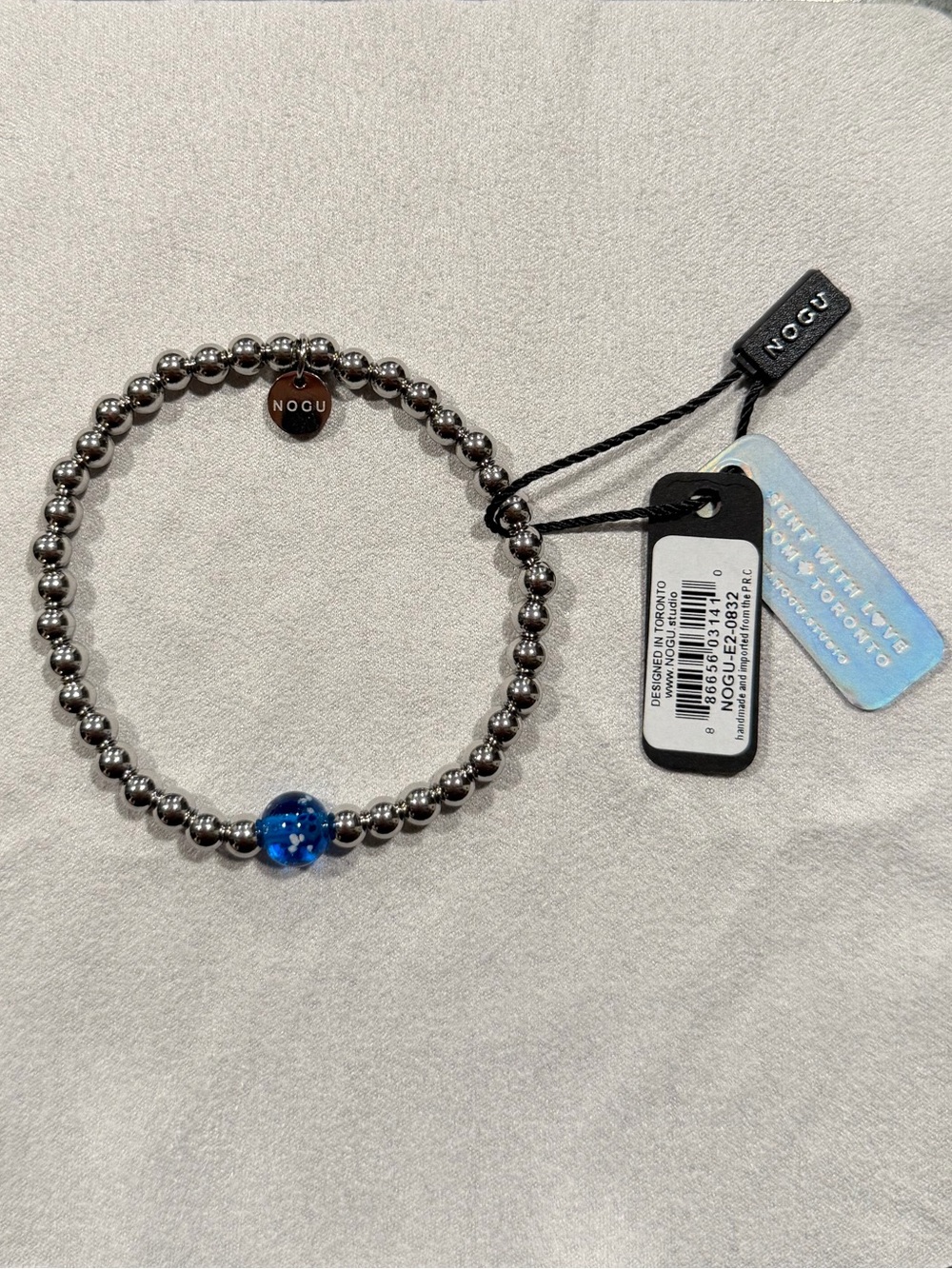 NWT NOGU Bracelet With Blue Firefly Bead